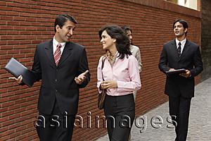 Asia Images Group - business associates, walking