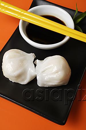 AsiaPix - Dim sum on plate with soy sauce