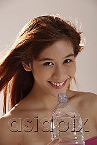 AsiaPix - Asian girl drinking water and smiling