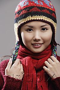AsiaPix - Head shot of Chinese woman in knitted hat