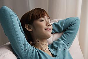 AsiaPix - Asian girl relaxing with eyes closed