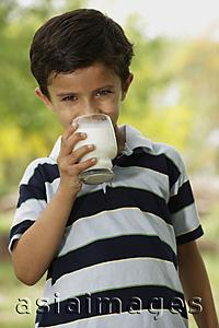 Asia Images Group - boy drinking glass of milk