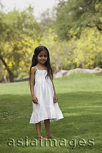 Asia Images Group - Little girl standing in park