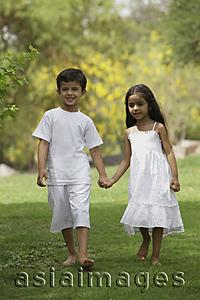 Asia Images Group - two children holding hands