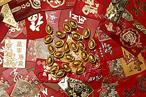 AsiaPix - Gold money, ingot scattered on red packets or Hong Baos