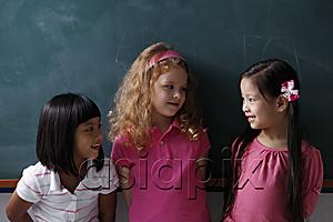 AsiaPix - three young girls smiling at each other