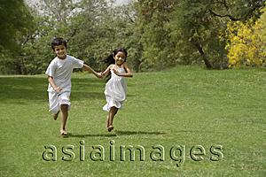 Asia Images Group - kids running in park, holding hands