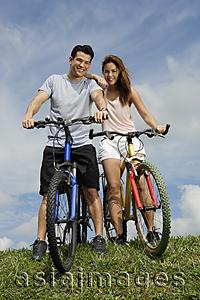 Asia Images Group - Couple on bicycles