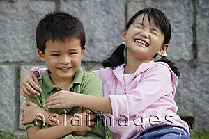 Asia Images Group - Girl with arms around boy