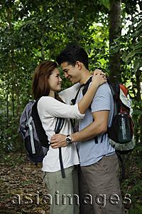 Asia Images Group - Couple embracing on hike