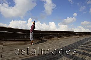 Asia Images Group - Man looking up to sky