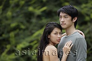 Asia Images Group - Young couple embracing