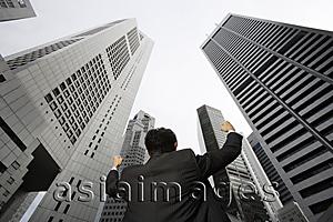 Asia Images Group - Businessman raising arms in air