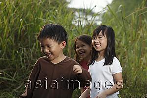 Asia Images Group - Three children playing.