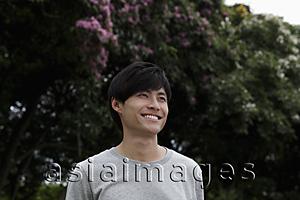 Asia Images Group - Chinese man smiling outside