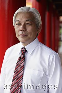 Asia Images Group - Profile of older man with white hair wearing shirt and tie