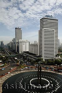 Asia Images Group - Welcome Monument and buildings along Jalan Thamrin, Jakarta