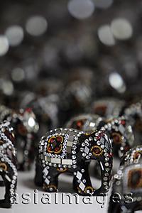 Asia Images Group - Elephant figurines decorated with mirrors and beads