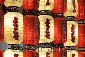 Asia Images Group - Glowing red and white paper lanterns