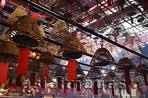 Asia Images Group - Incense hanging from ceiling in Man Mo temple, Hong Kong