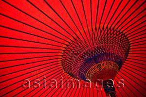 Asia Images Group - detail shot of inside of red paper umbrella