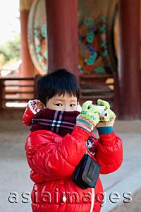 Asia Images Group - Young boy taking photo with Camera at Bulguksa Temple, Gyeongju Korea