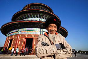 Asia Images Group - Temple of Heaven or Tiantan,Elderly Man in front of Hall of Prayer for Good Harvests. Beijing, China