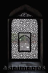 Asia Images Group - Light coming through stone lattice at Humayun's Tomb. New Delhi, India