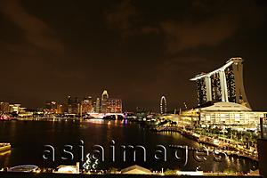 Asia Images Group - View of the buildings surrounding Marina Bay at night, Singapore