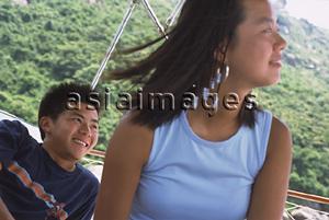 Asia Images Group - Teenagers on boat, smiling