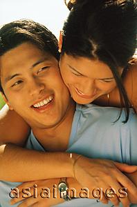 Asia Images Group - Young couple embracing
