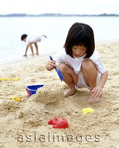 Asia Images Group - Girl playing at the beach