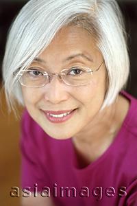 Asia Images Group - Mature woman with glasses, portrait