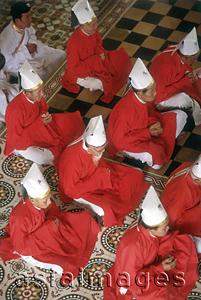 Asia Images Group - Vietnam, Tay Ninh, priests in red garments in Cao Dai Great Temple.