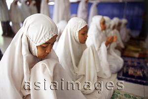 Asia Images Group - Indonesia, Jakarta, Students recite verses from the Koran at Asshiddiqiyah Islamic College.