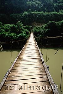 Asia Images Group - Vietnam, North tribal area,  footbridge spanning river