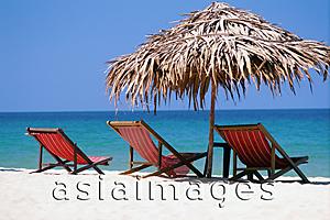 Asia Images Group - Vietnam, beach chairs and umbrella on Nha Trang Beach