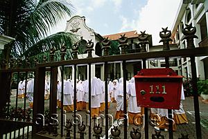 Asia Images Group - Singapore, students assemble inside gates of the Madrasah Alsagoff Al-Arabiyah (school).
