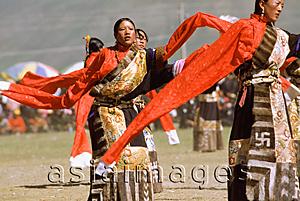 Asia Images Group - China, Szechuan (Sichuan), Kham region, Tibetan dancers performing at festival.