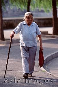 Asia Images Group - China, Beijing, old woman walking with cane