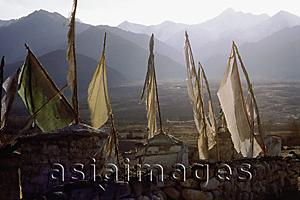 Asia Images Group - India, Northern India, Srinagar-Leh Road, Prayer flags at dawn, mountains at background.