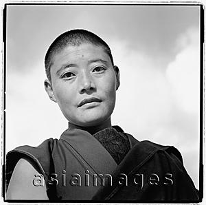 Asia Images Group - India, near Dharamsala, Dolma Ling Nunnery, Portrait of Tibetan nun.