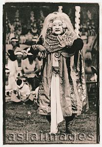 Asia Images Group - Indonesia, Bali, Gianyar, Mask (Topeng) dancer performing in temple grounds. (artistic grain)