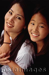 Asia Images Group - Mother and daughter, smiling, hugging