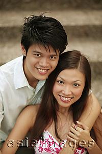 Asia Images Group - Couple smiling, looking at camera.