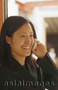 Asia Images Group - Young woman on mobile phone