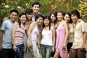 Asia Images Group - Group of friends looking at camera, smiling