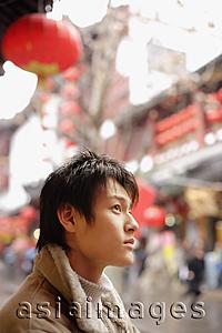 Asia Images Group - Young man looking away, profile