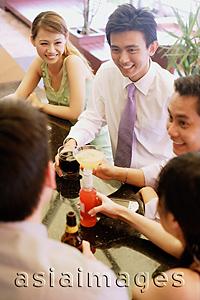 Asia Images Group - Group of young adults talking at bar ( high angle view)