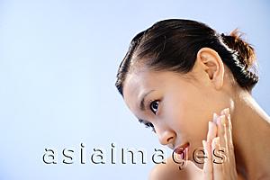 Asia Images Group - Woman looking away, head bent down